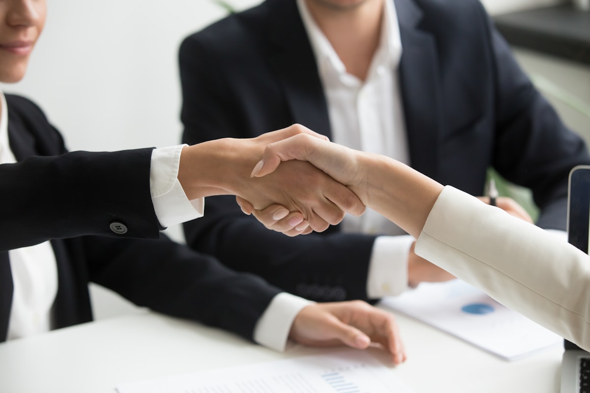 Business handshake closing an agreement
