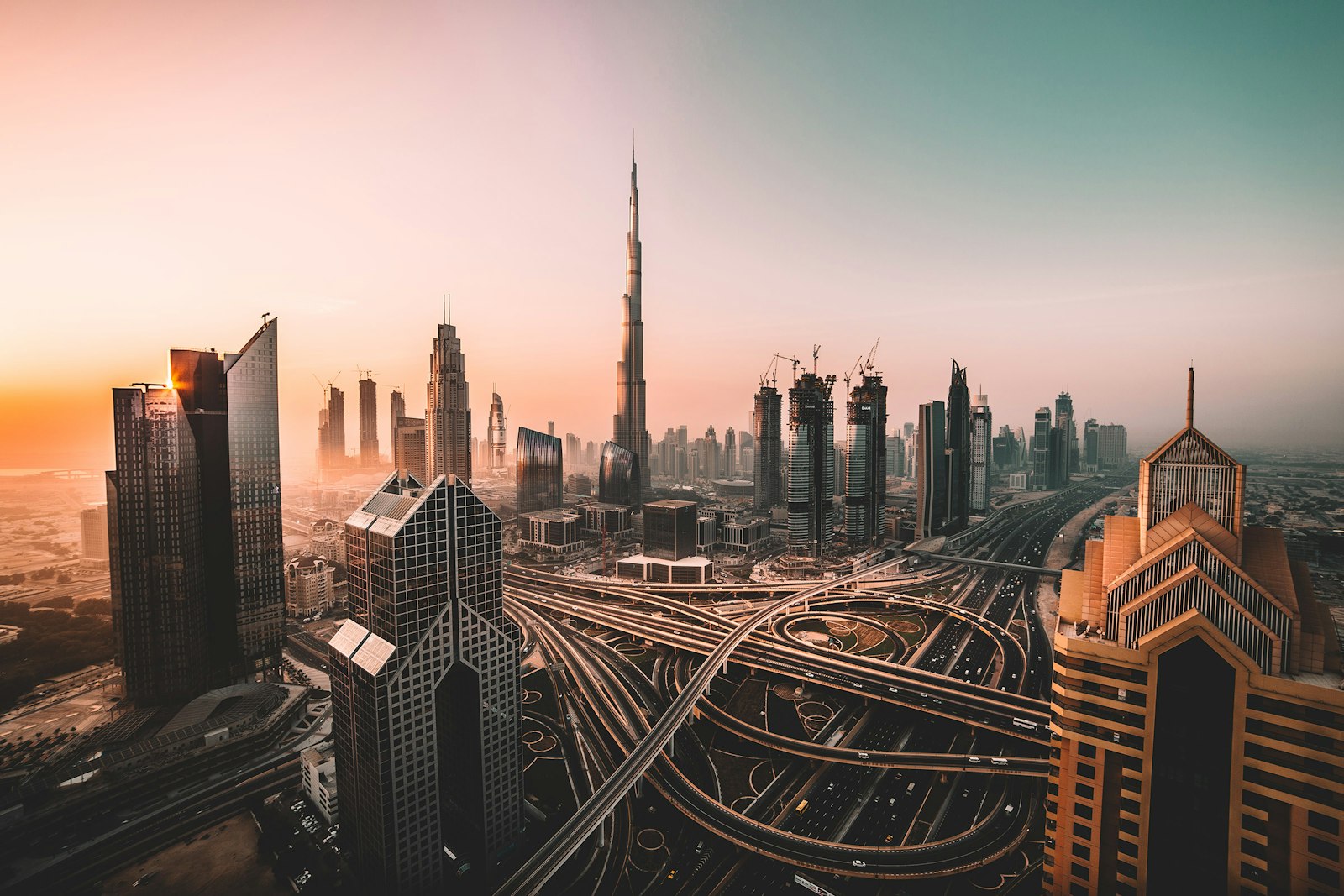 Dubai skyline at sunrise with the Burj Khalifa